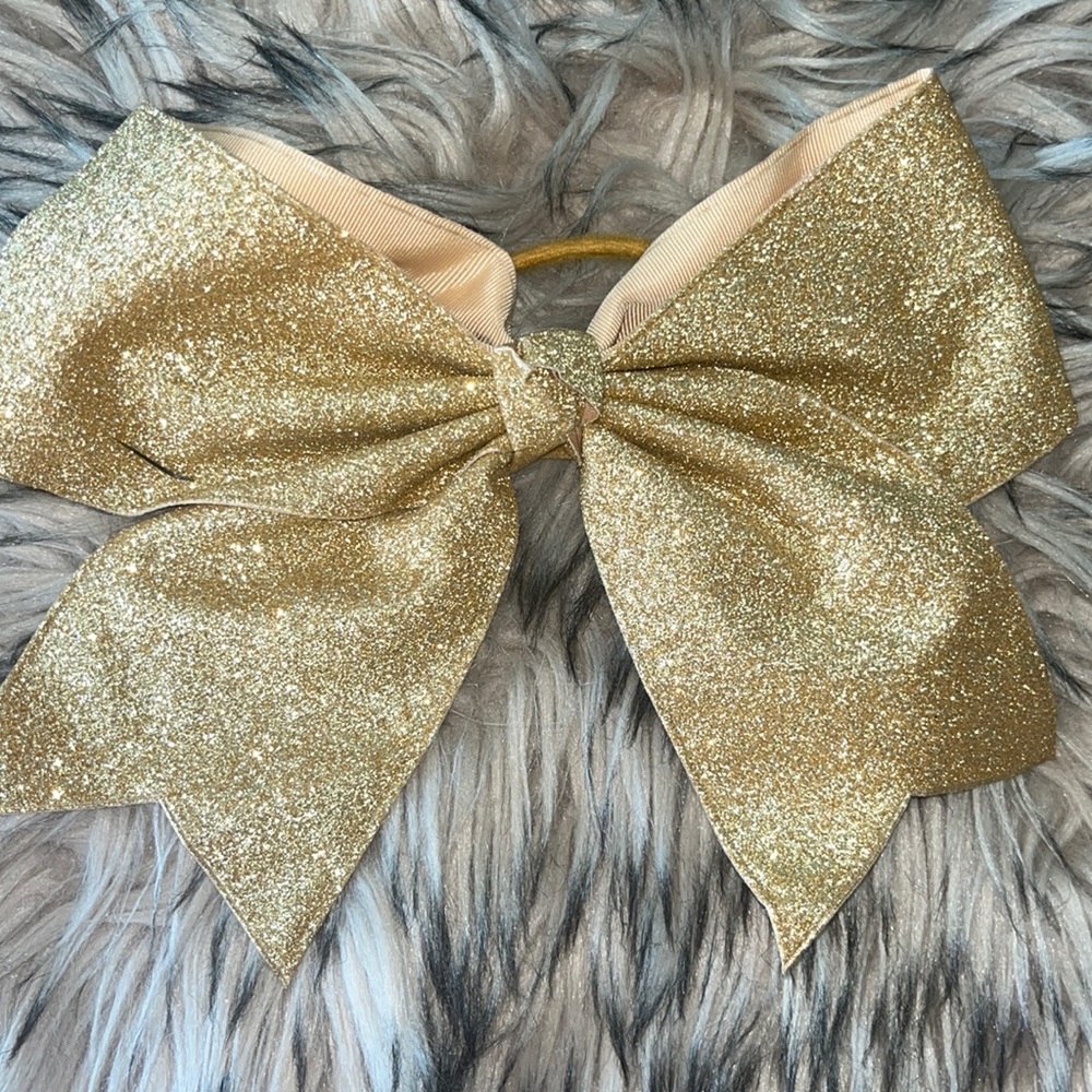 sparkling gold bow